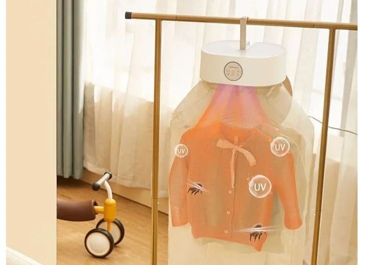 Electric Clothes Drying Machine (آلة تجفيف الملابس الكهربائية)